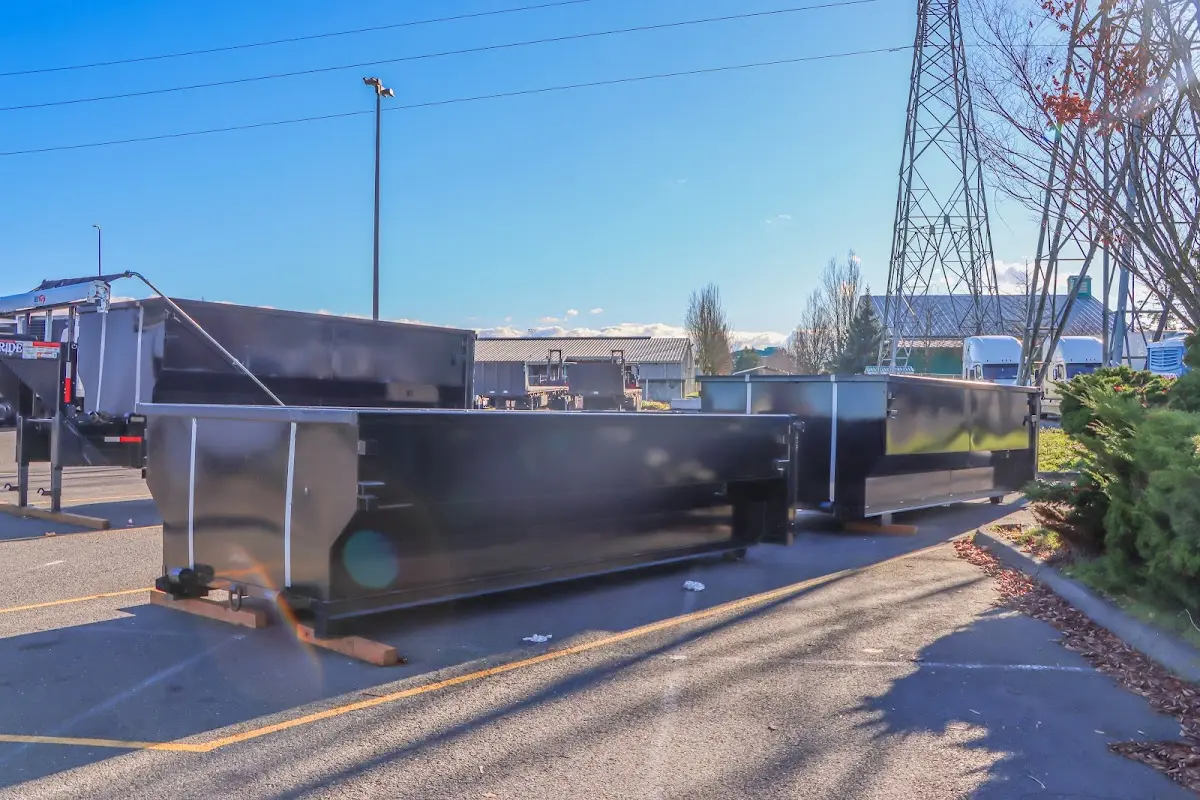 Roll-off dumpster ready for waste disposal at job site for 2 Yard Dumpster Rental in Easley